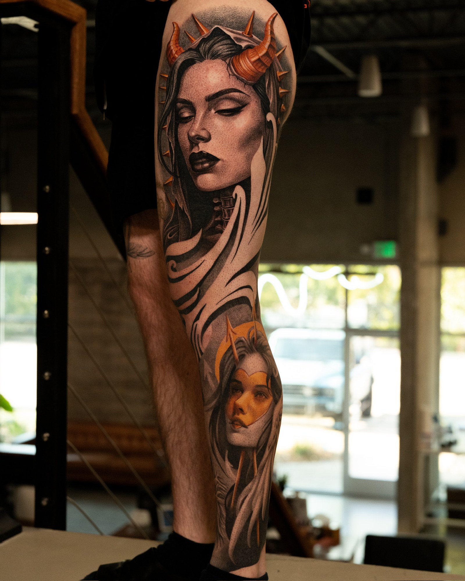 Horned woman and haloed portrait full leg sleeve tattoo by Jon LaFlore, Dallas TX
